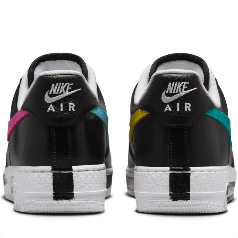 Nike Low-Top Sneakers – Black with Multicolor Swooshes & Daisy Details