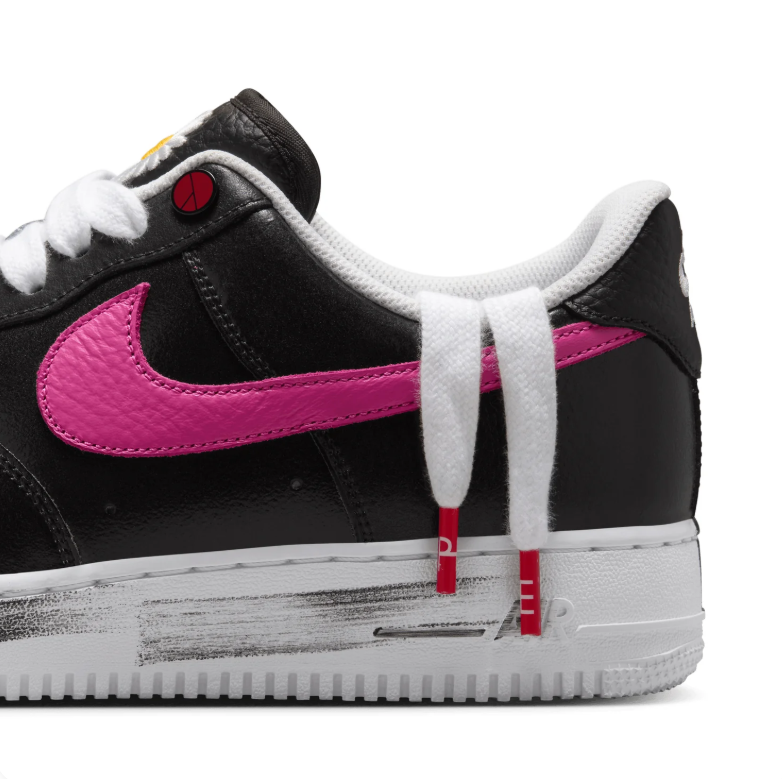 Nike Low-Top Sneakers – Black with Multicolor Swooshes & Daisy Details